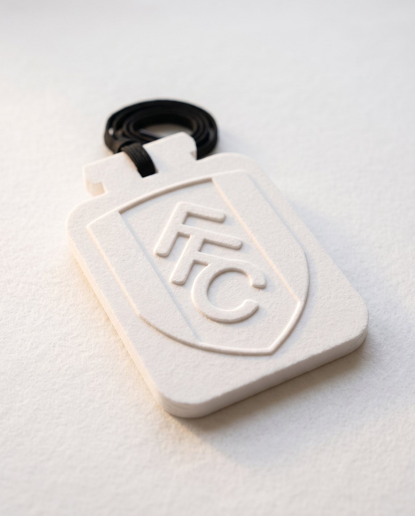 A Scentz bespoke moulded car card, the white edition